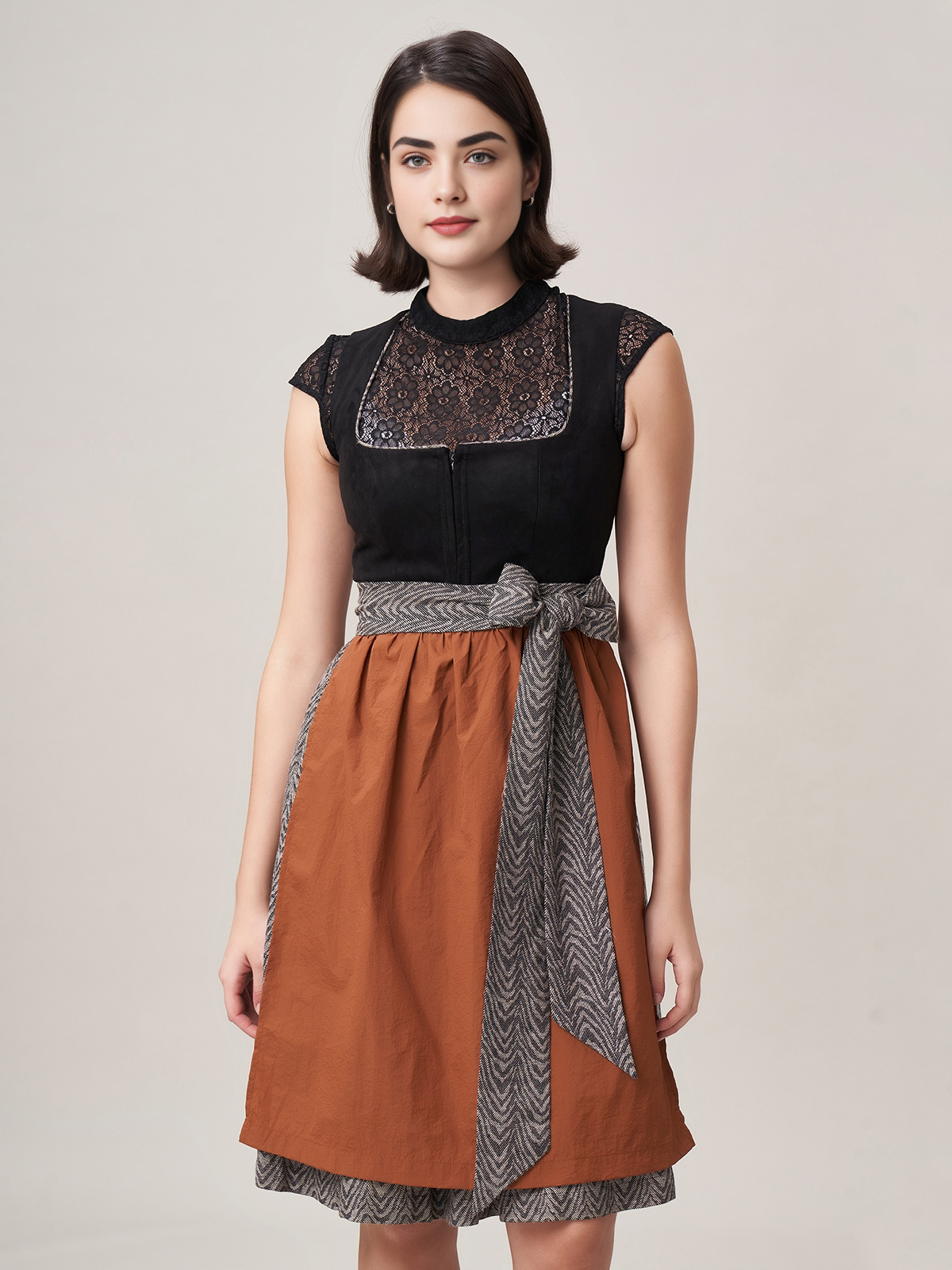 Schwarzes Dirndl mit traditioneller Stickerei